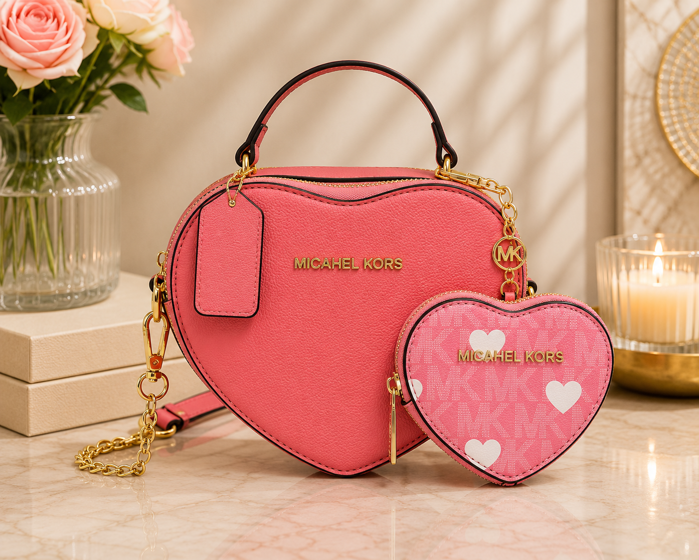 Michael Kors heart shaped handbag in coral pink with gold hardware and matching MK monogram coin purse with white hearts