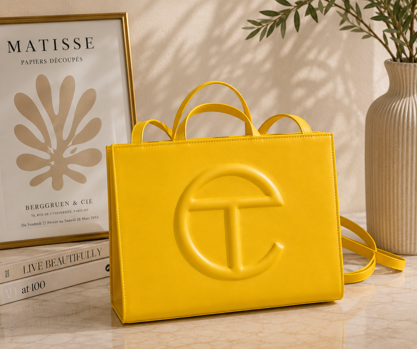 Telfar Shopping Bag in yellow vegan leather with embossed logo and detachable shoulder strap
