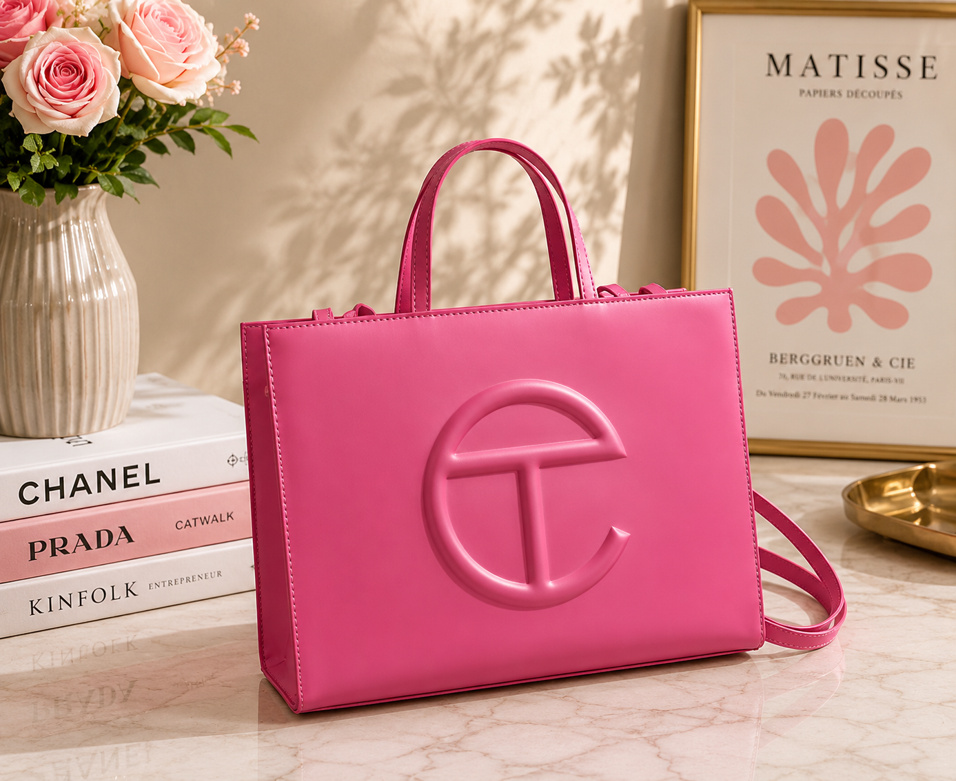 Telfar Shopping Bag in hot pink fuchsia vegan leather with tonal embossed logo and detachable shoulder strap