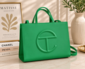 Telfar Shopping Bag in kelly green vegan leather with tonal embossed logo and detachable shoulder strap