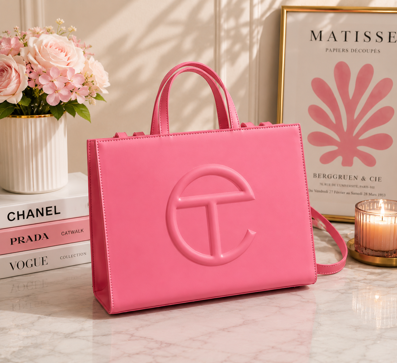 Telfar Shopping Bag in bubblegum pink vegan leather with tonal embossed logo and detachable shoulder strap