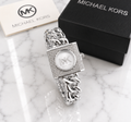 Michael Kors pavé crystal square lock watch with white mother-of-pearl dial on silver Cuban chain bracelet with MK logo and gift box