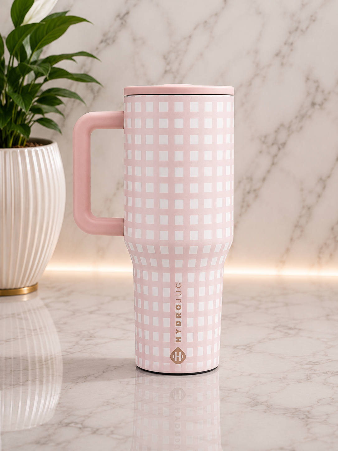 HydroJug Pink Gingham 40oz Tumbler with blush pink handle and lid on marble surface