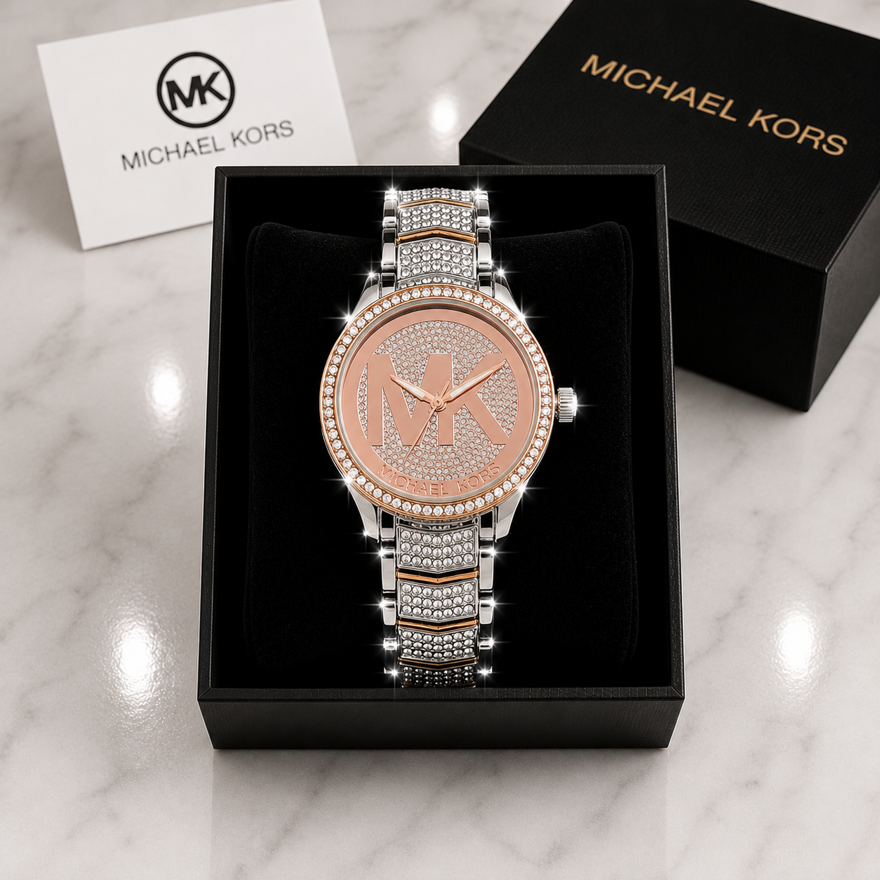Michael Kors Ladies Quartz Watch rose gold and silver two-tone with pave MK logo dial and crystal bracelet in luxury gift box on marble surface