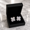 CZ Clover Pavé Stud Earrings in silver displayed in a black luxury gift box