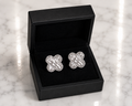 CZ Baguette Clover Stud Earrings in silver displayed in a black luxury gift box