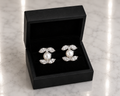 Marquise CZ and Pearl Stud Earrings in silver displayed in a black luxury gift box
